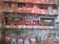 Tibetan Namgyal Cafe in Dharamsala, the exile town of Tibetans  with dcorated with paper money and coins given by tourist all over the world