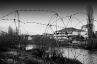 Barbed wire separates the Serbian and Albanian territory in Kosovska Mitrovica