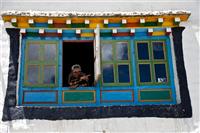 A local Loba women gives directions from my traditional styled window in Lo Manthang